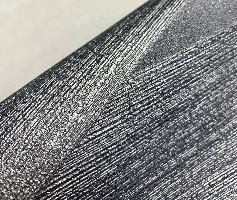 Wallpaper installed in a room showing its full pattern, color