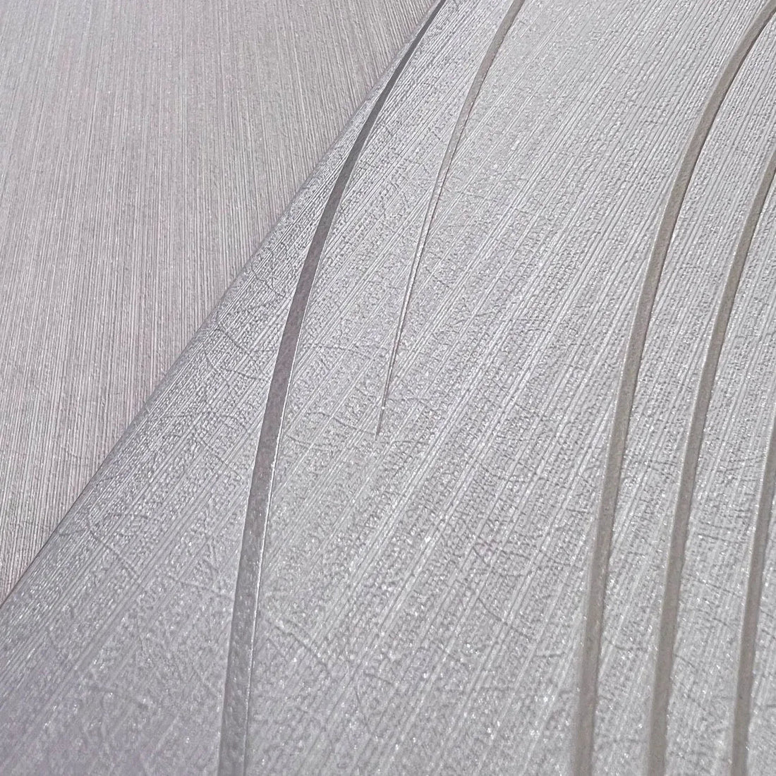 Closeup of a wallpaper showing its Contemporary, Cream, Embossed, Neutrals, Textures, Waves pattern, color, and subtle texture.