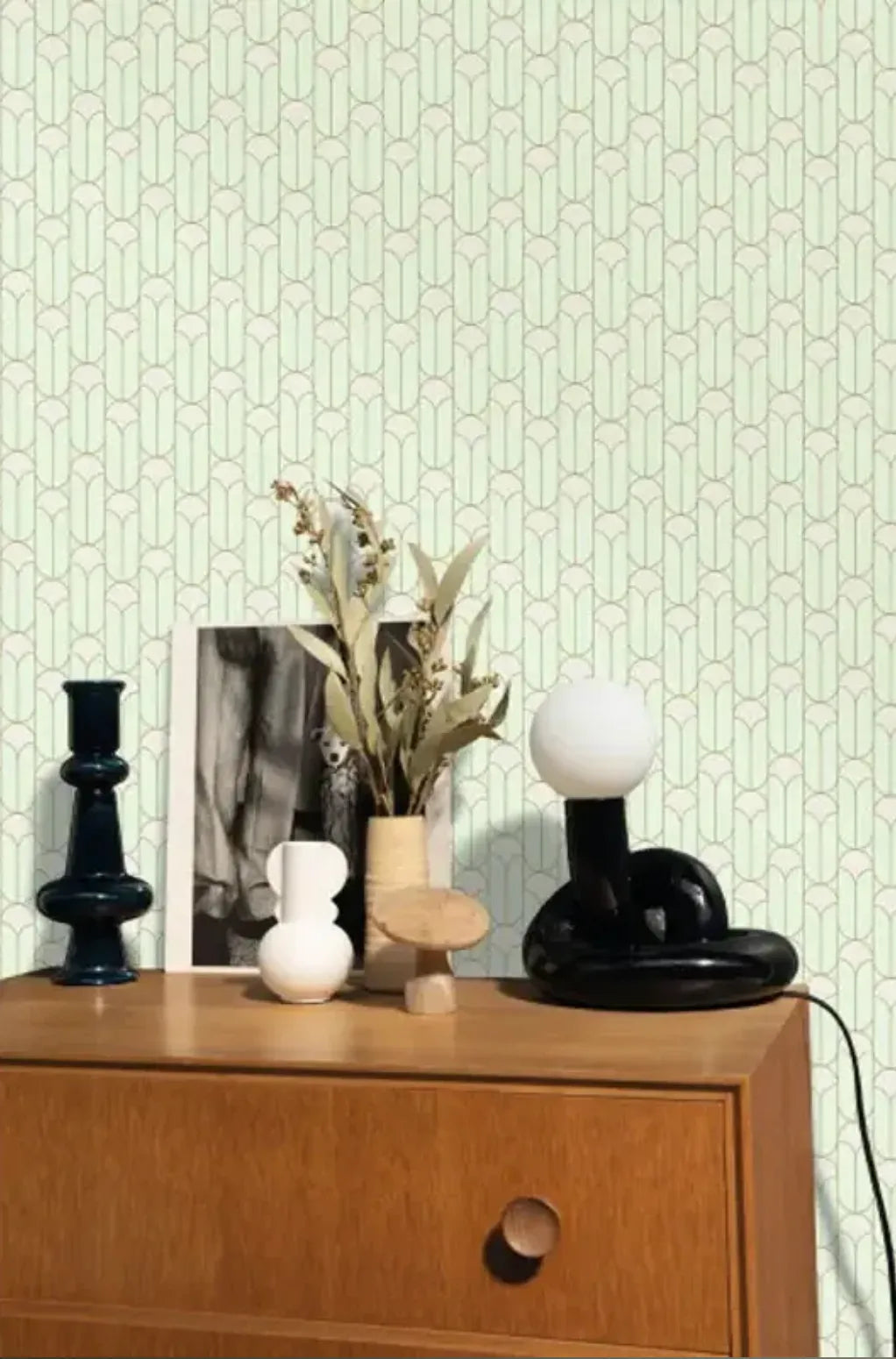 Wallpaper installed in a room showing its full pattern, color