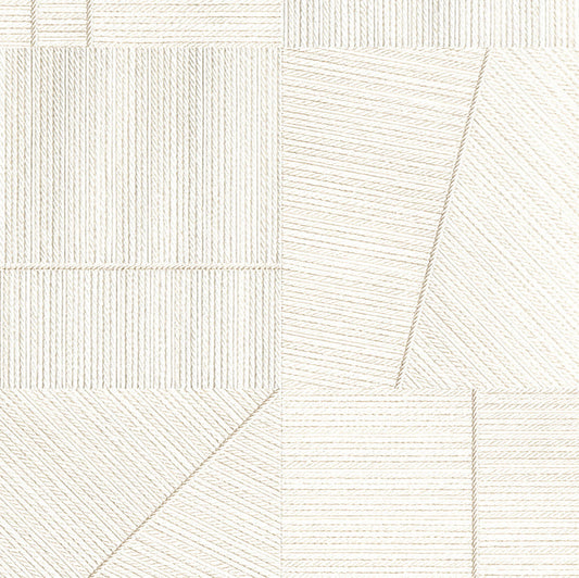 White geometric patterned tile on a white background