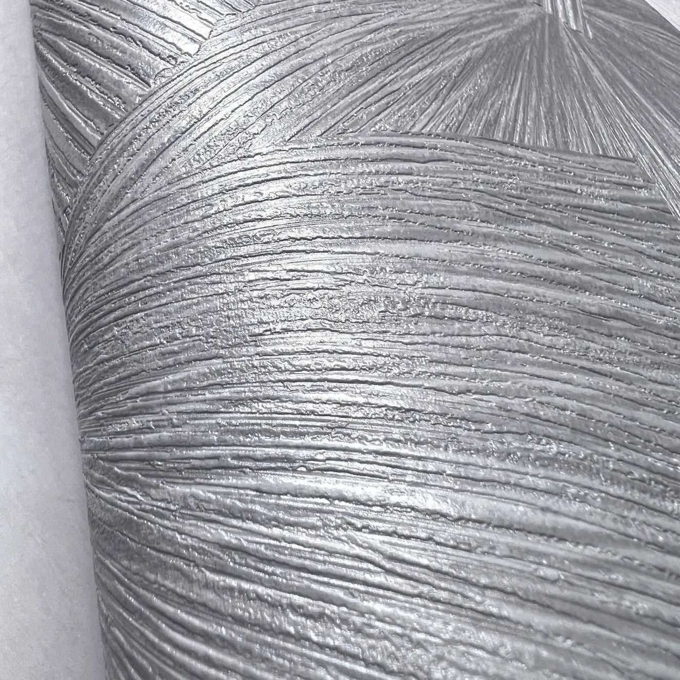 Wallpaper installed in a room showing its full pattern, color