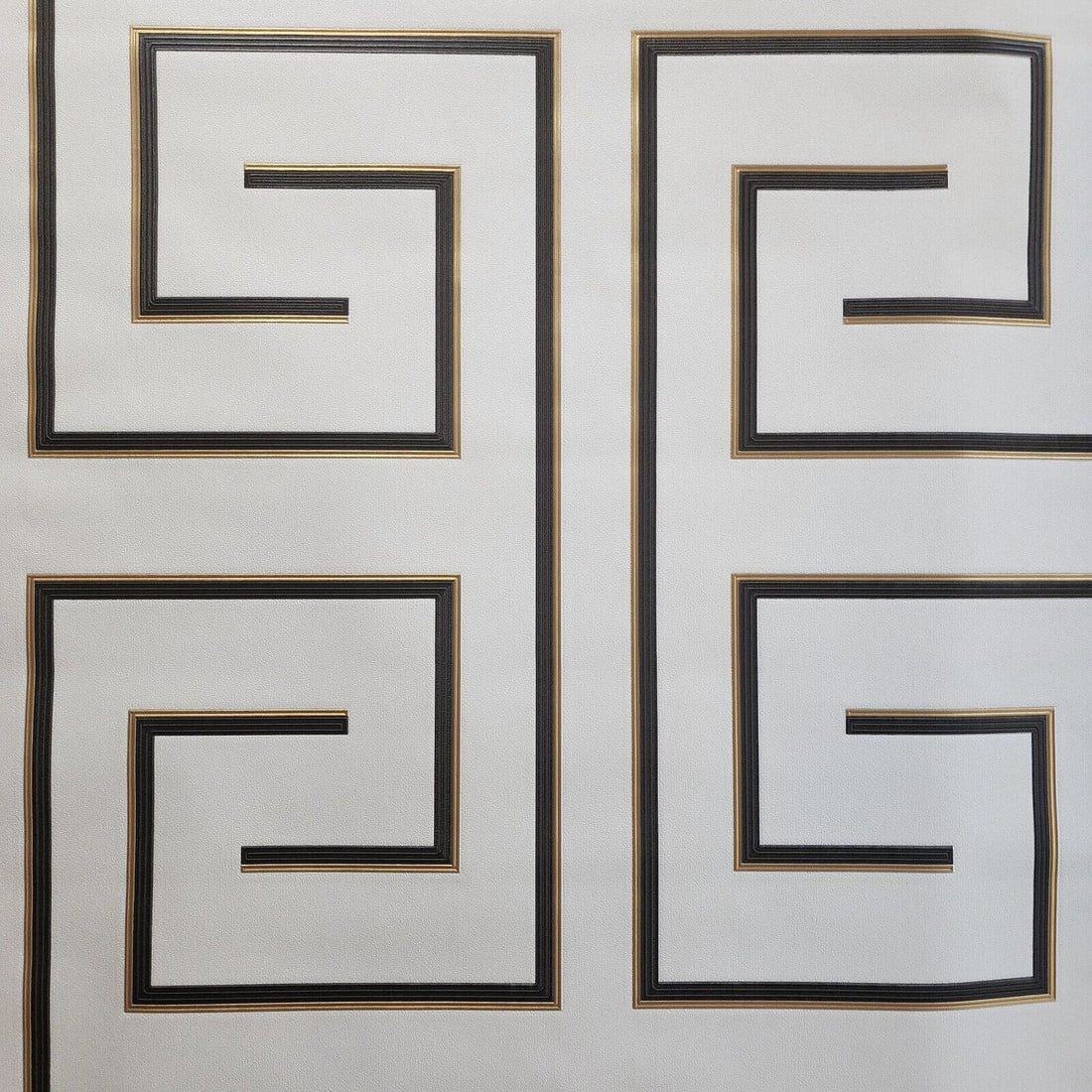 Decorative wallpaper with geometric patterns on a light background