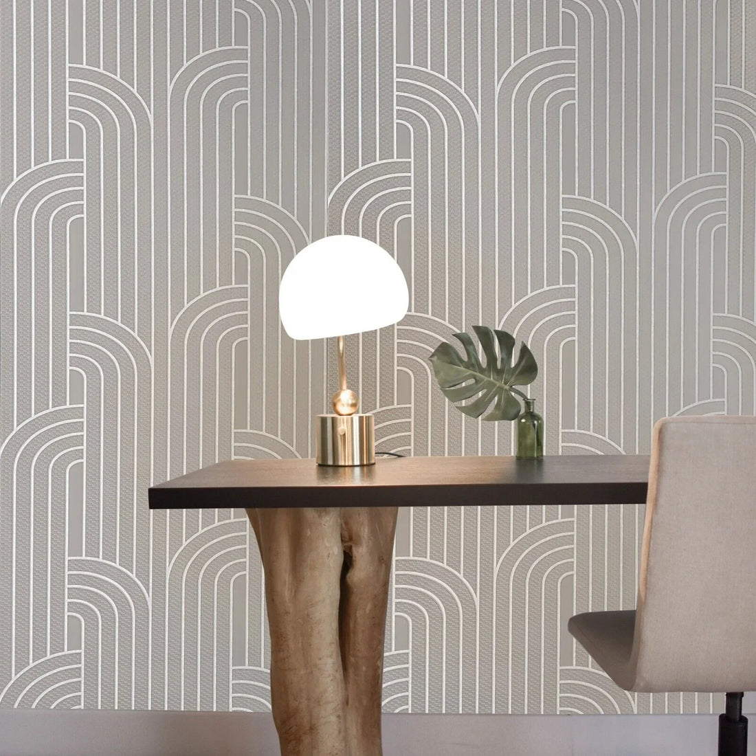 Patterned wallpaper with wavy lines on a gray background
