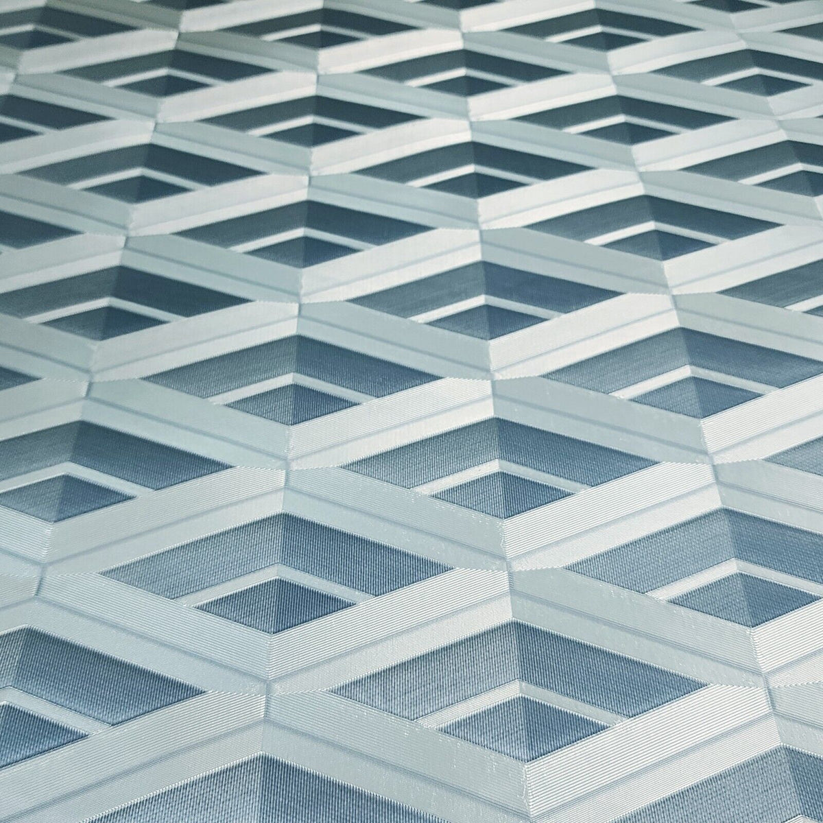 Geometric patterned wallpaper with blue and white design