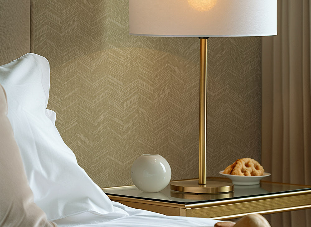 Textured beige wallpaper with a herringbone pattern