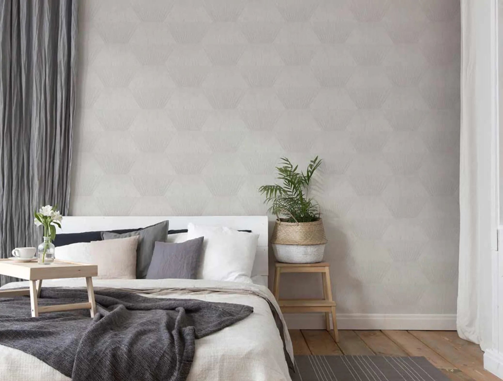 Wallpaper installed in a room showing its full pattern, color