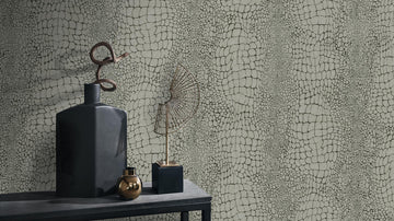 Room scene showing Erismann Cameo 10529-11 taupe abstract embossed wallpaper on a feature wall