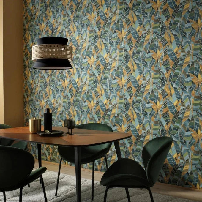 Erismann Elle Decoration 4 green botanical wallpaper with layered leaf pattern and textured finish set in a mid-century modern dining room 