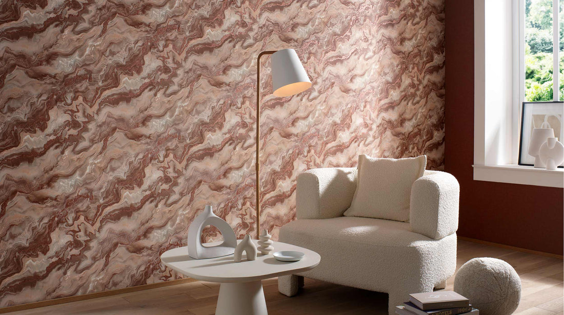 Erismann Elle Decoration 4 marble effect wallpaper in warm terracotta tones styled in a modern living room with neutral furniture