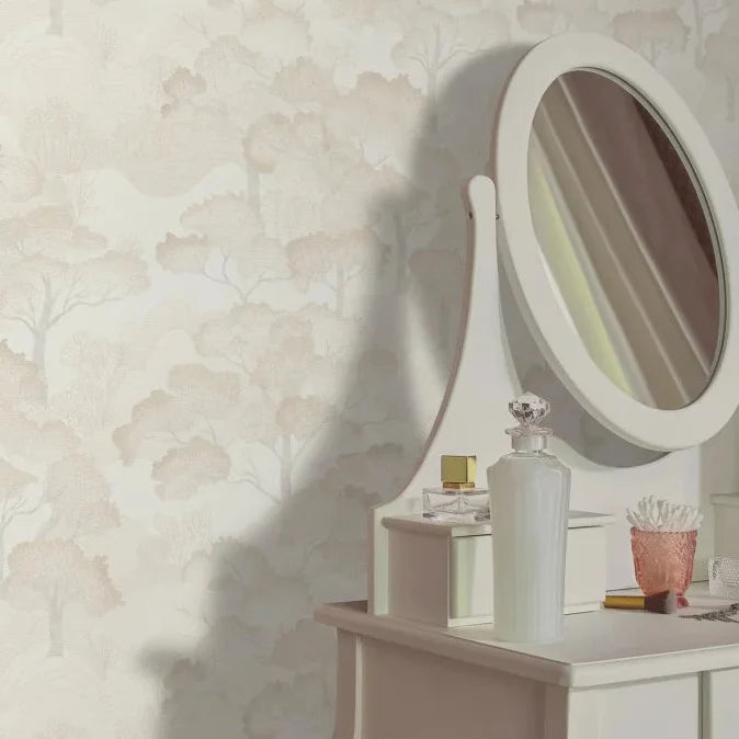Erismann Elle Decoration 4 light scenic wallpaper with layered trees in warm cream tones behind a mid-century makeup table