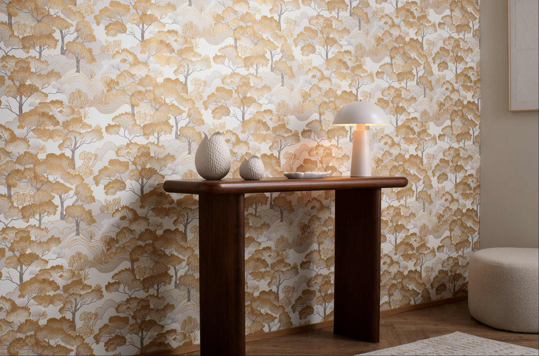 Erismann Elle Decoration 4 scenic wallpaper with layered trees in soft gold tones