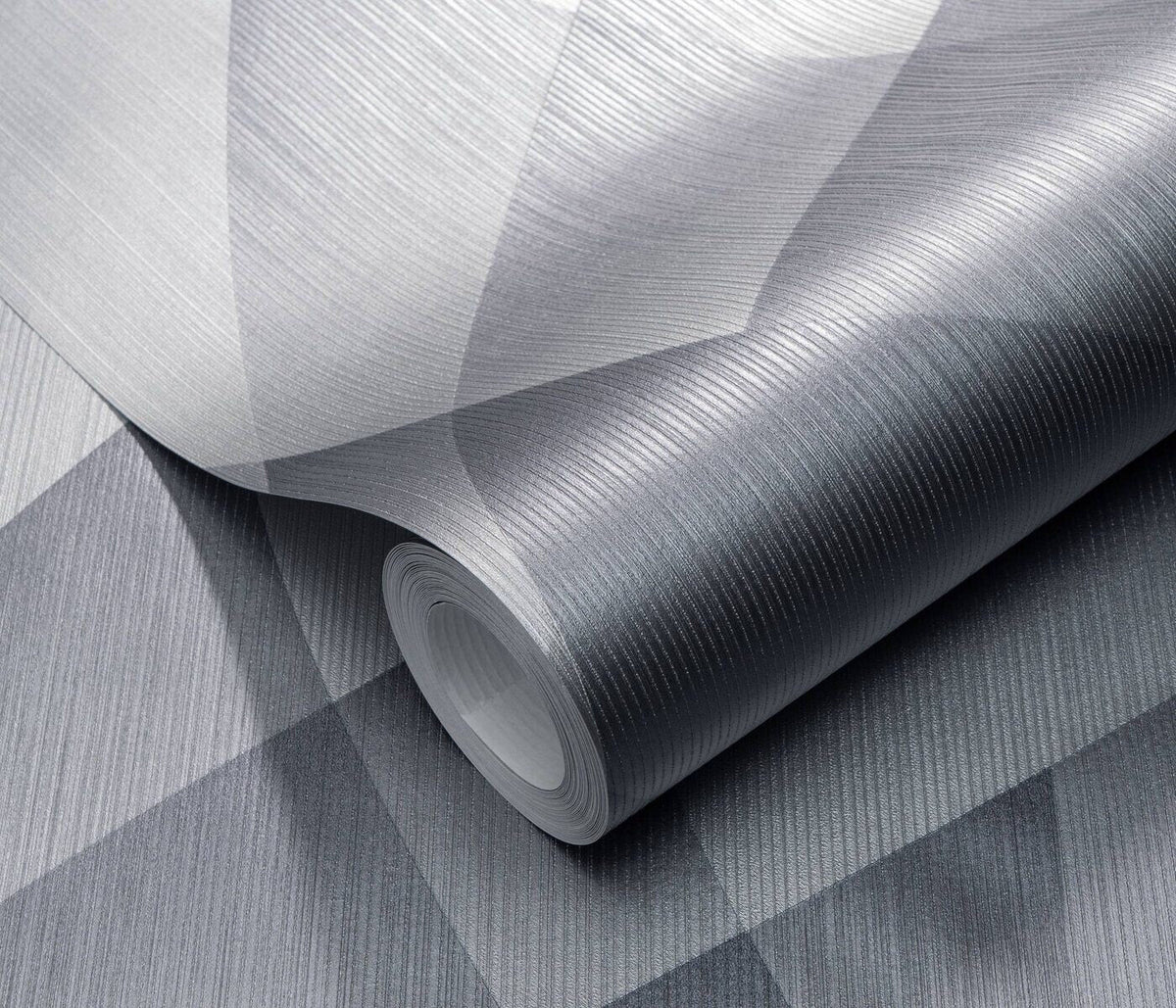 Erismann Fashion For Walls 4 10374-29 wallpaper close-up of rolled sheet with fine ridged texture and geometric pattern, modern and sleek.
