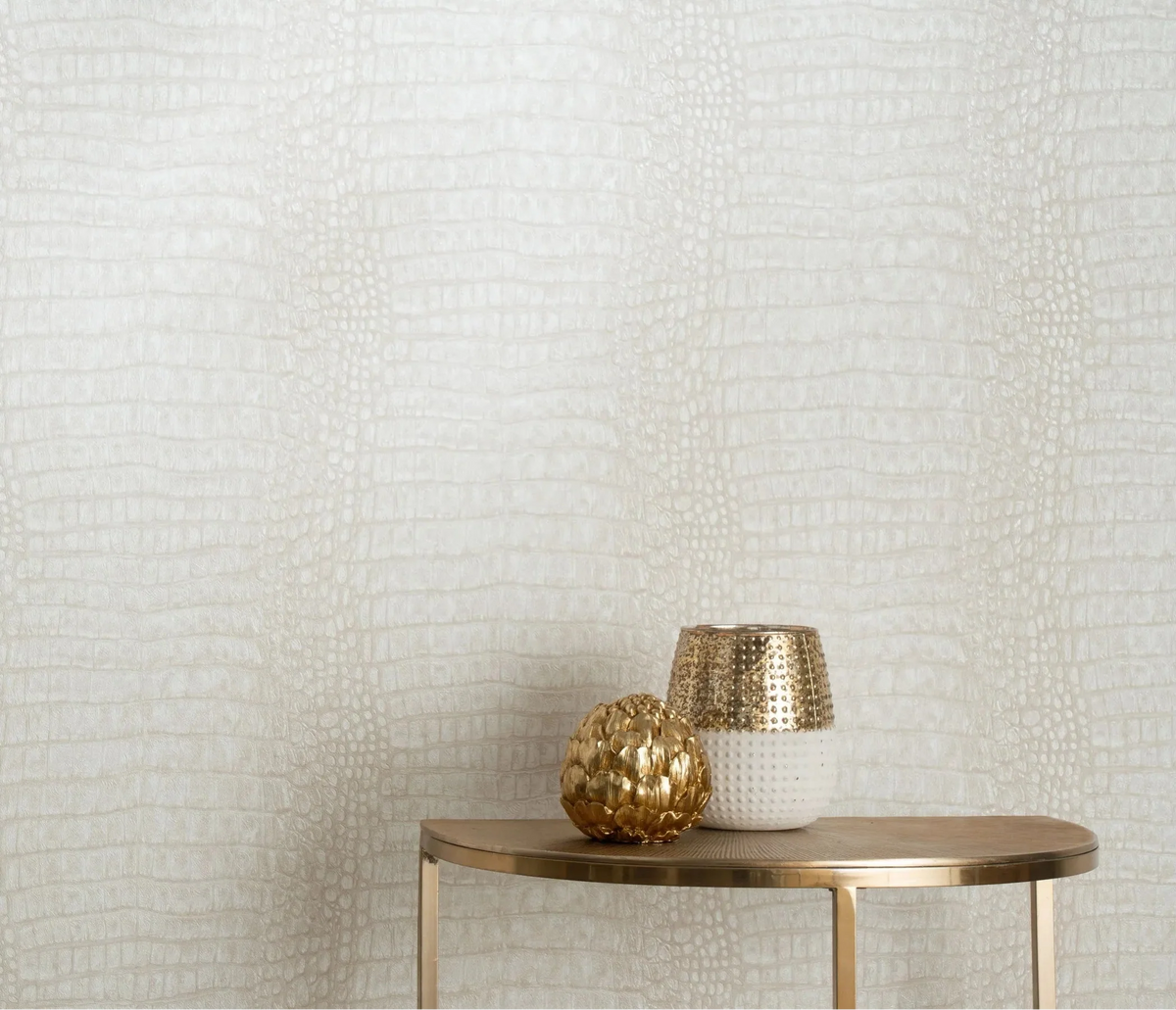 Erismann Forest Dreams 10560-02 wallpaper behind a gold side table with a two-tone vase and metallic decorative sphere.