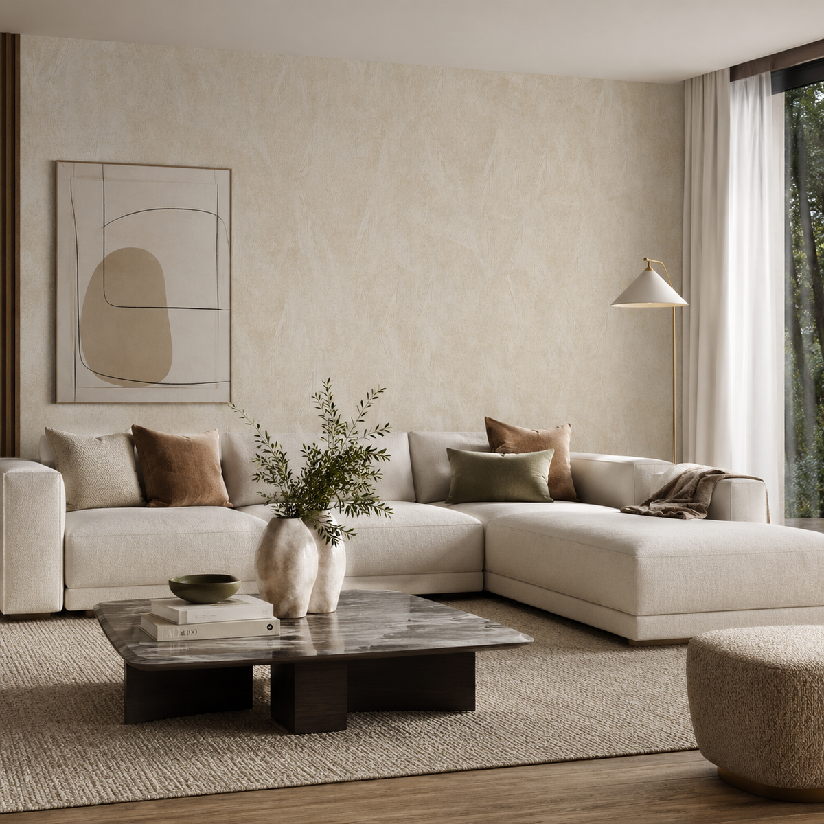 Erismann Opus 10439-02 light neutral textured wallpaper in a modern living room with a cream sectional sofa, soft taupe cushions, marble coffee table, and warm contemporary styling.