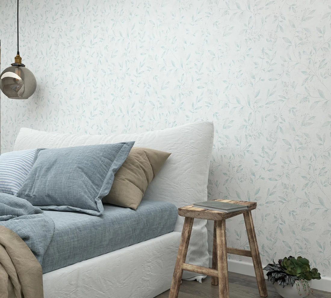 Marburg City Glam 32631 wallpaper with soft white ground and subtle vine leaves.