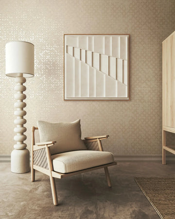 Marburg City Romance 35117 Tonal beige wallpaper with a small-scale damask/filigree motif and a slight reflective sheen wallpaper on a living room feature wall.