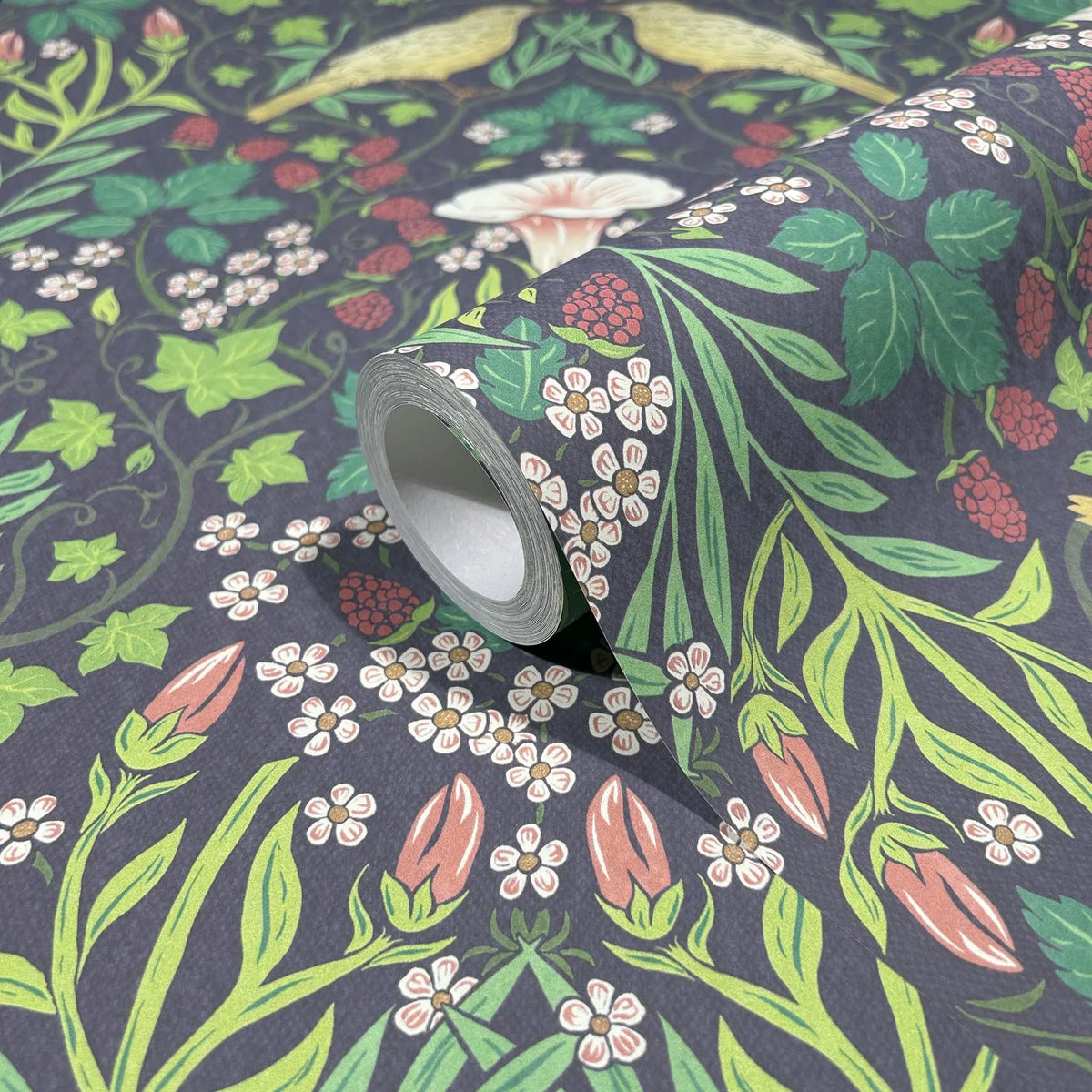 Marburg 47621 wallpaper close-up of botanical pattern with green leaves, berries, and small white flowers on a dark background.