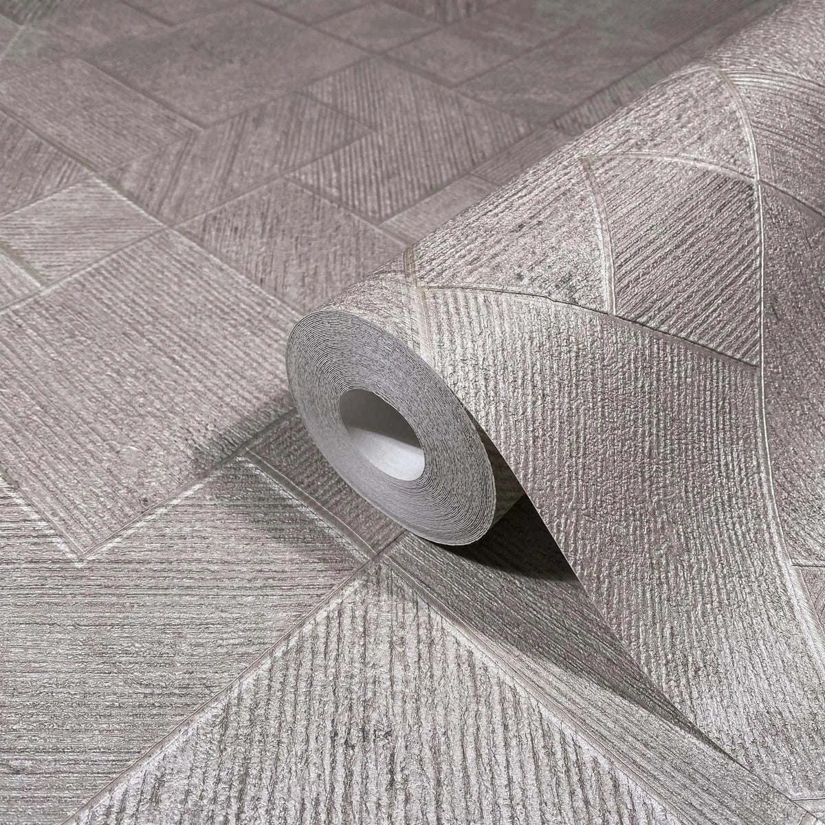 Marburg Ritus 35510 Wallpaper roll on matching unrolled wallpaper showing a geometric block pattern of squares and rectangles with fine linear texture in beige and gray.