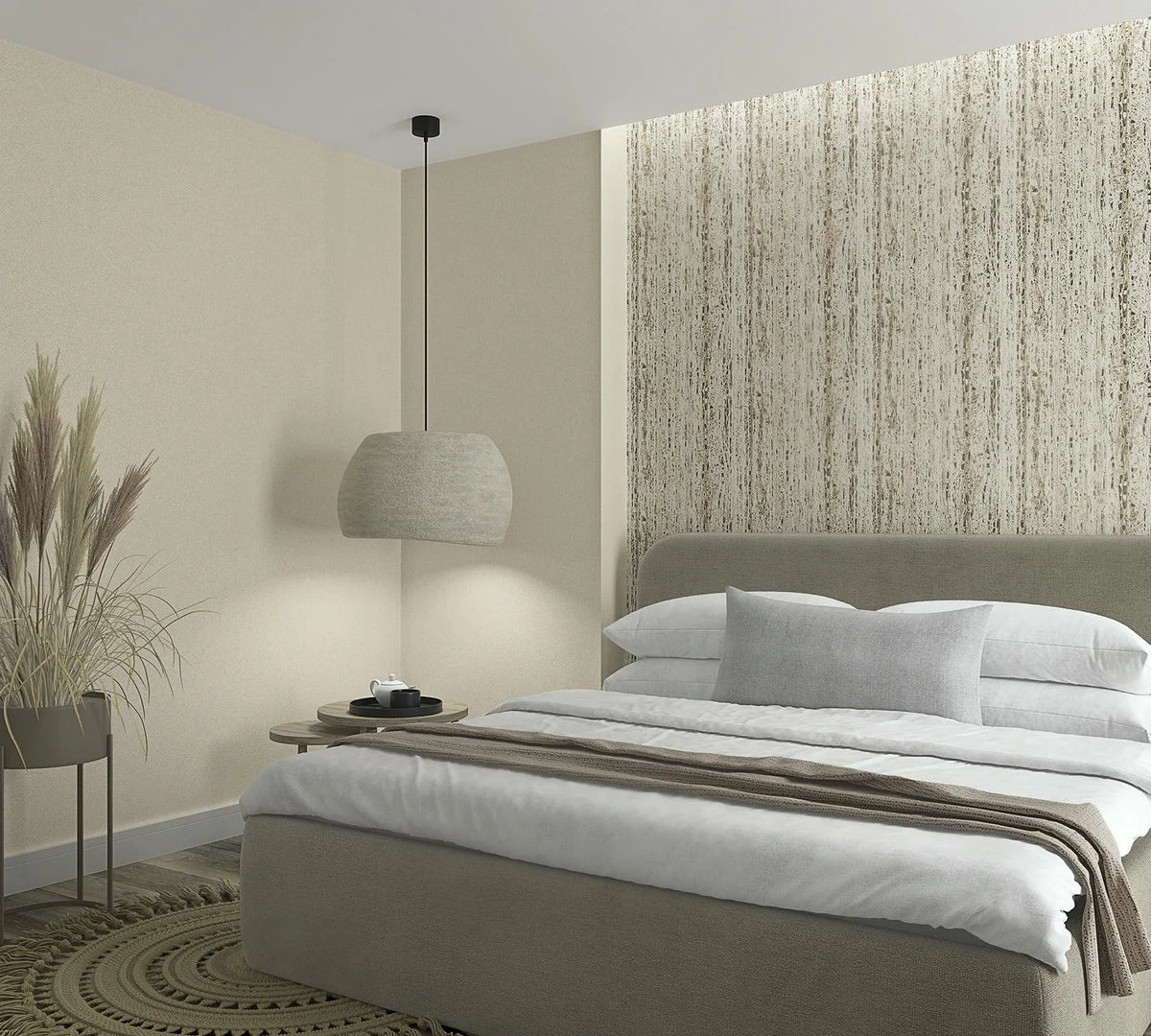 Marburg Travertino 33363 Beige wallpaper with irregular vertical streaks and tonal variation, creating a textured look wallpaper on a bedroom feature wall.