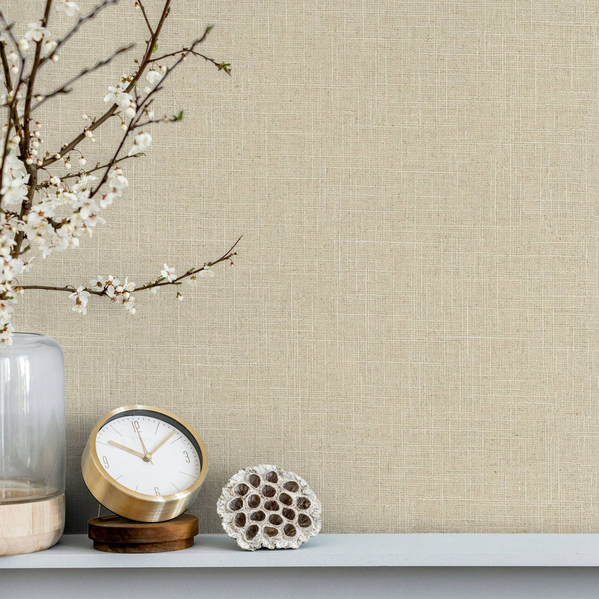 Marburg Travertino 33392 Beige wallpaper with a subtle linen-look crosshatch texture forming an irregular grid wallpaper shown in a styled detail.