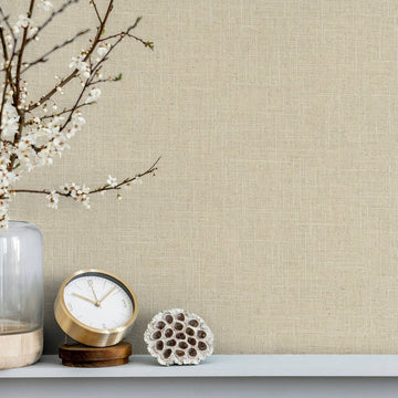 Marburg Travertino 33392 Beige wallpaper with a subtle linen-look crosshatch texture forming an irregular grid wallpaper shown in a styled detail.