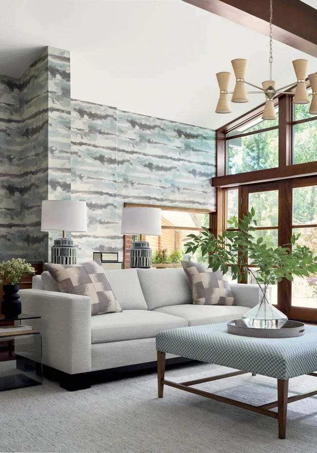Thibaut Silver Lining Mineral T24421 abstract cloud pattern on abaca grasscloth with metallic sheen in mineral grey and blue.