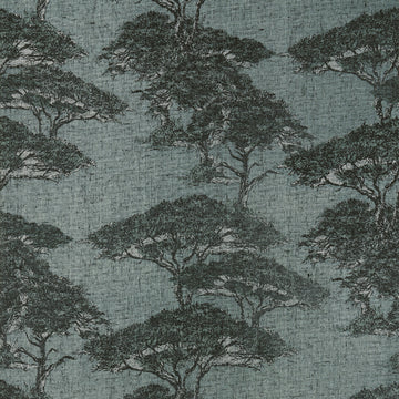 Thibaut Torrey Pines wallpaper in Mineral T24434 with layered pine trees on a dusty blue linen-mesh texture.
